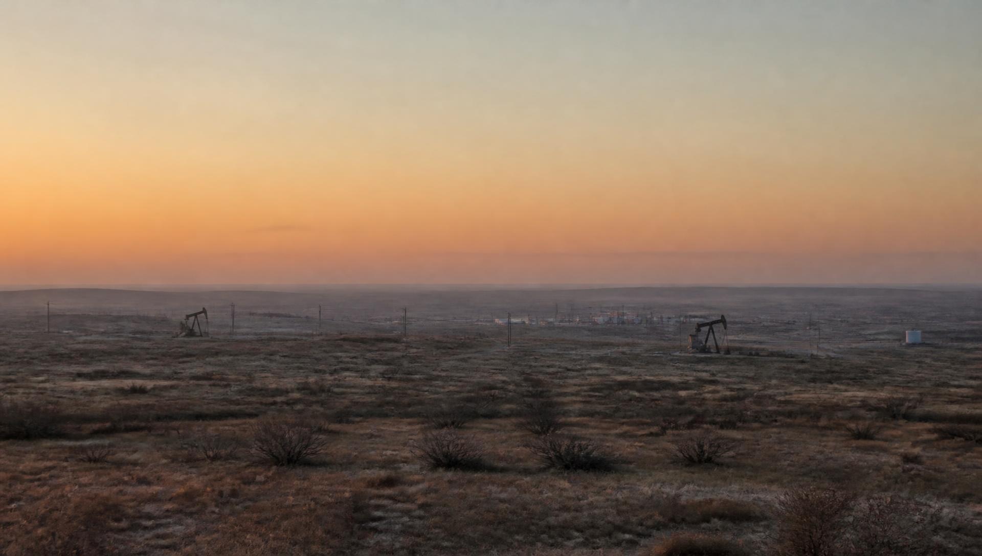 Permian Basin oilfield landscape at dawn